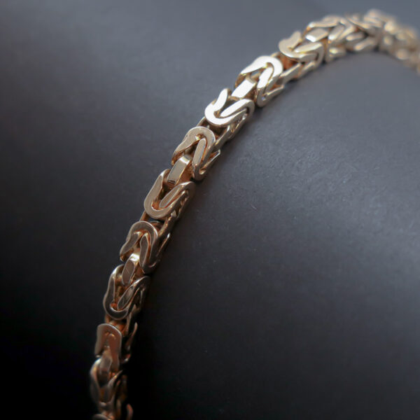 Armlænke i kongemønster i 14 karat guld