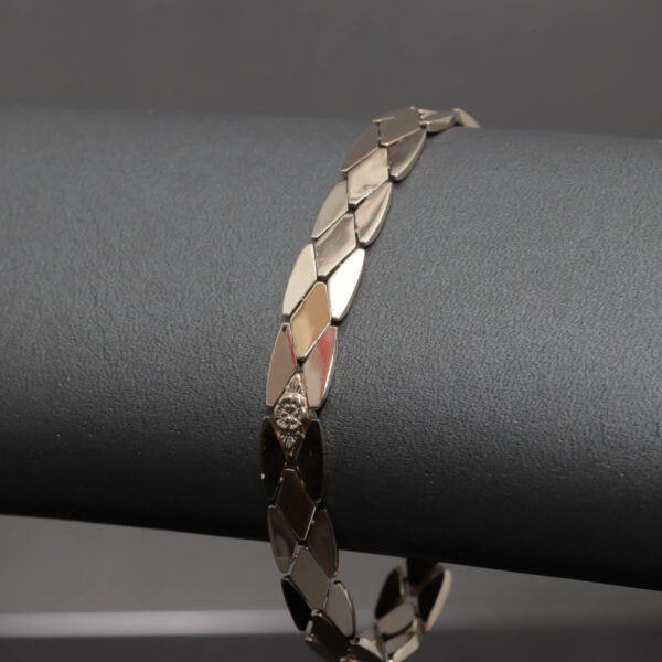 Elegant armlænke i 18 karat guld