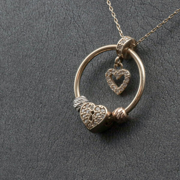 Halskæde med hjerte motiv vedhæng i 14 karat guld