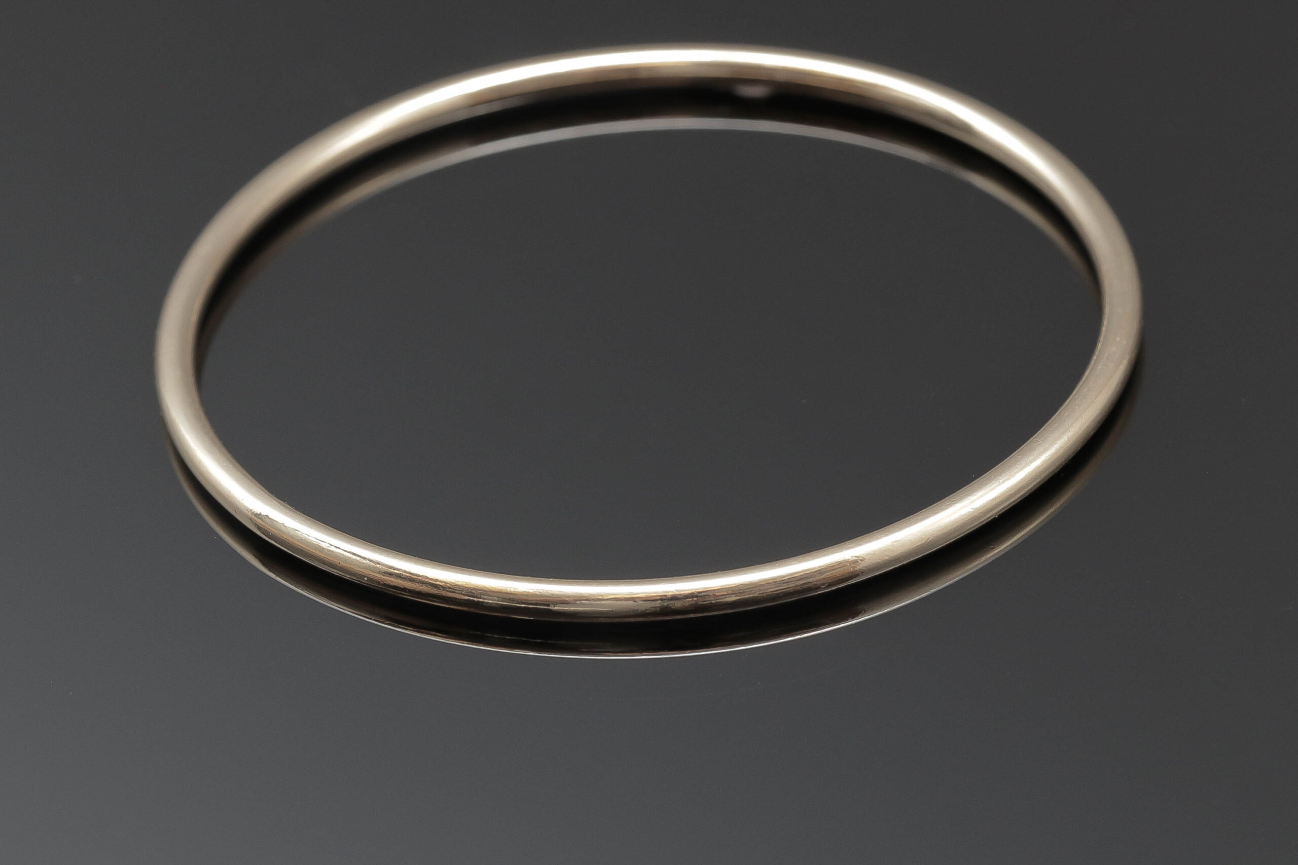 Massiv armring i 18 karat guld