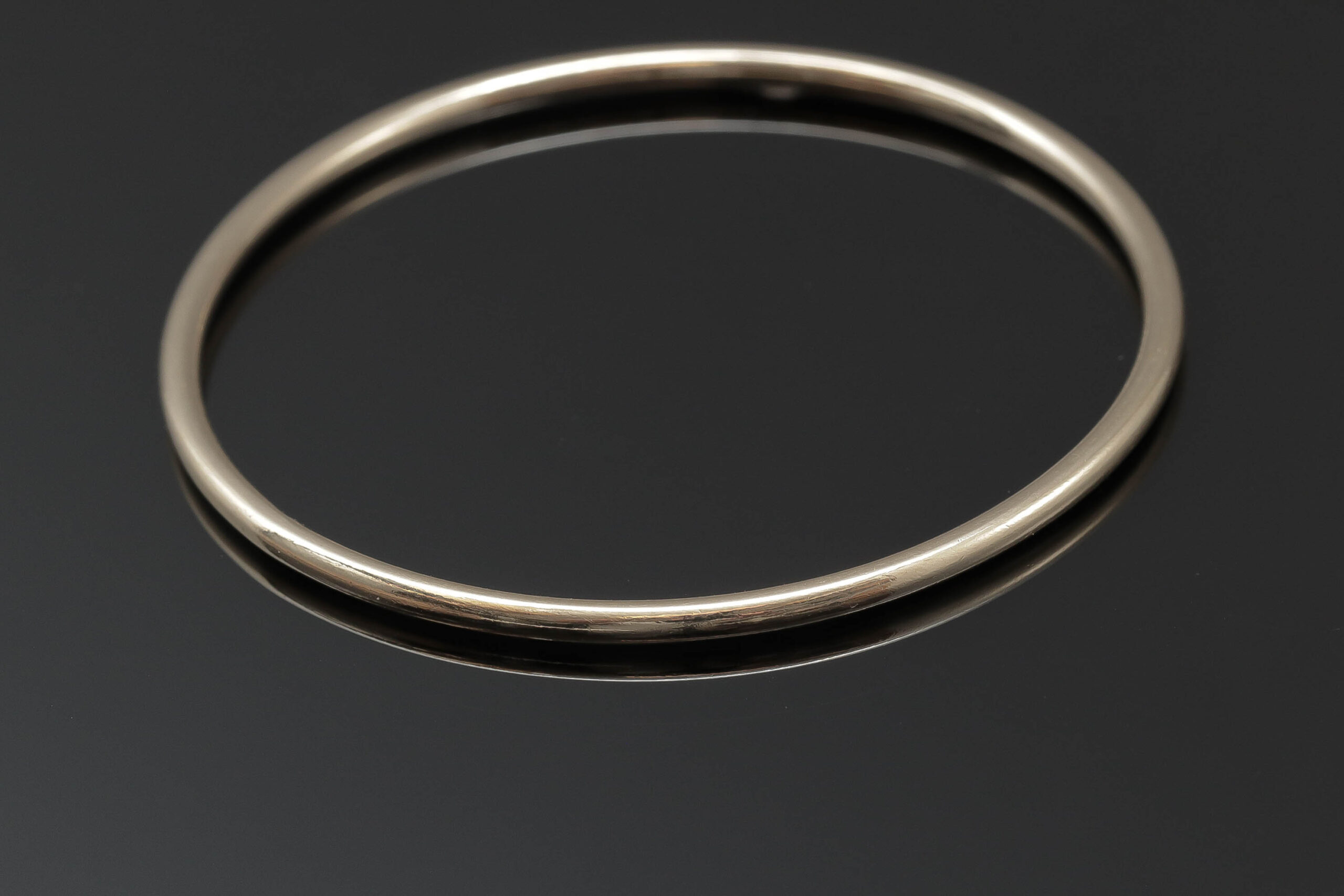 Massiv armring i 18 karat guld