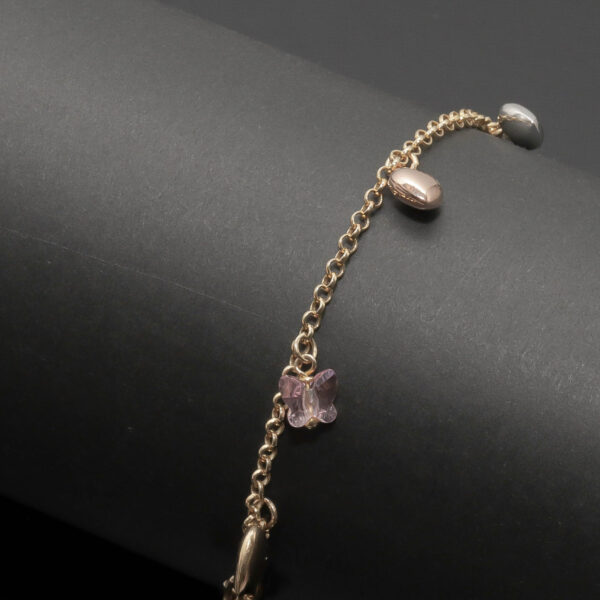 Armlænke med hjerte og glas sommerfugl charms i 14 karat guld