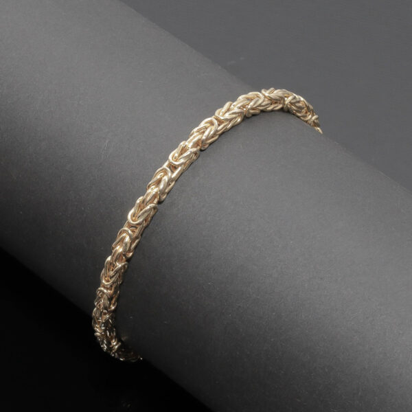 Konge mønster armlænke i 14 karat guld