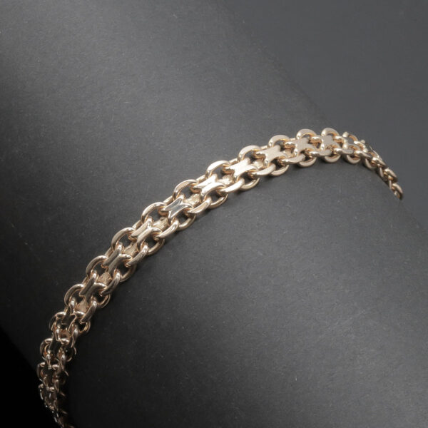 Flad flettet armlænke i 14 karat guld