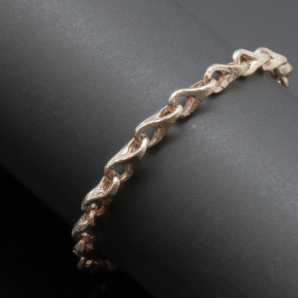 Elegant armlænke i 14 karat guld