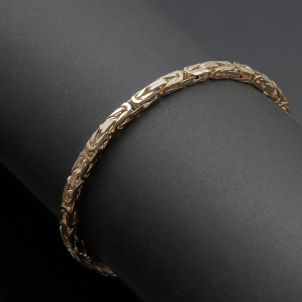Konge mønster armlænke i 14 karat guld