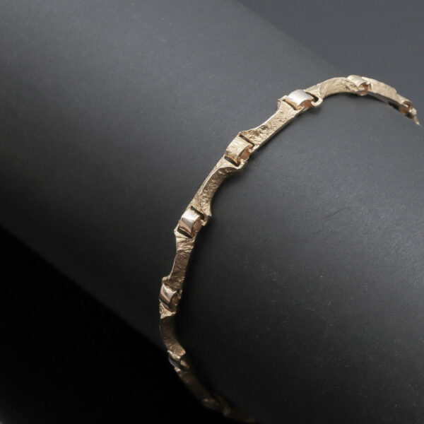 Lapponia armlænke i 14 karat guld