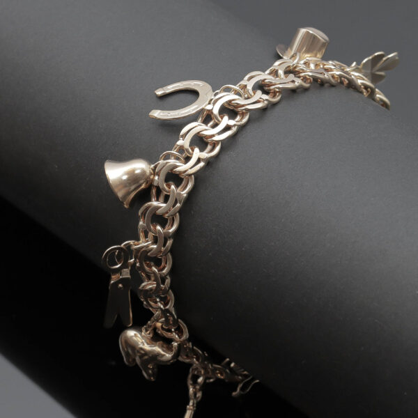 Bismarck armlænke med charms i 14 karat guld