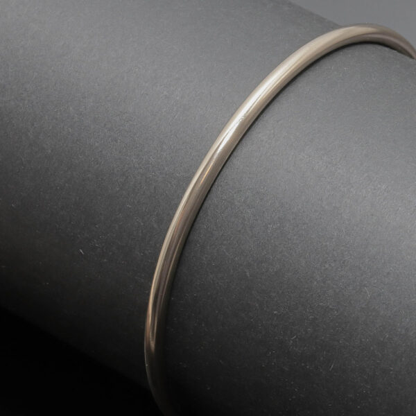 Massiv rundformet armlænke i 8 karat guld