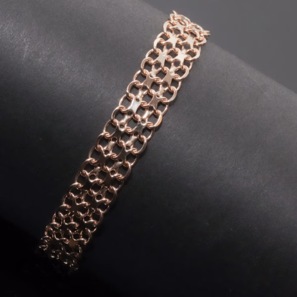 Fantasy armbånd i 18 karat guld